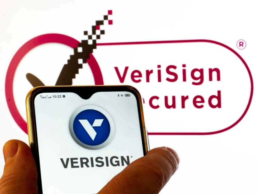 Technology (names J - Z) - Verisign Inc_ logo on phone and background-by IgorGolovniov via Shutterstock